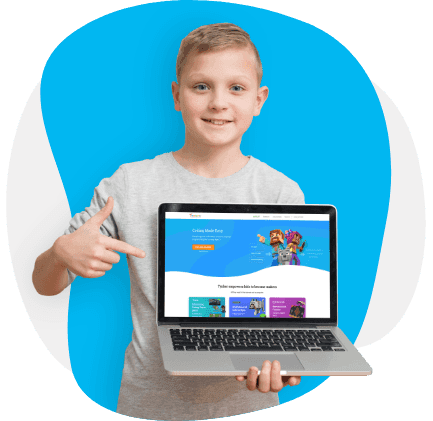 Code World student holding open laptop